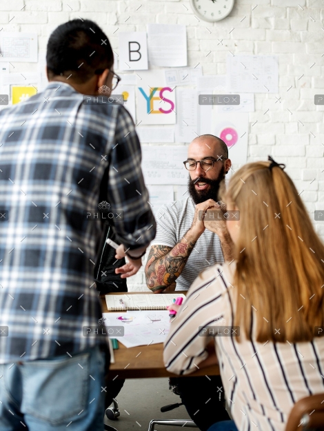 demo-attachment-62-group-of-colleagues-people-brainstorming-PGQFX6M